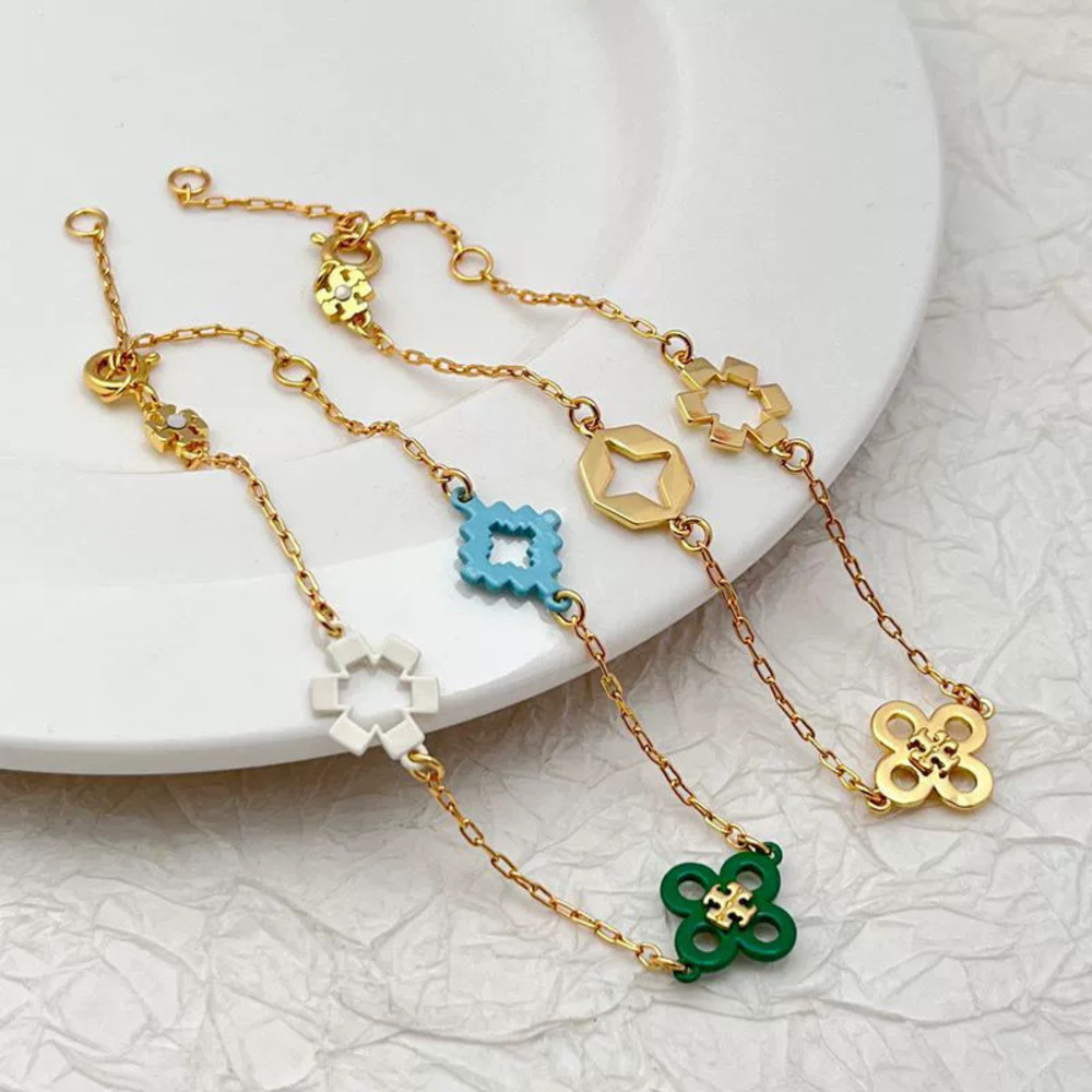 Tory Burch Gold Plated Enamel Hollow Four Leaf Clover Flower Bracelet
